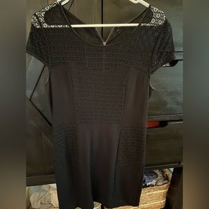 Black cocktail dress with lace detail